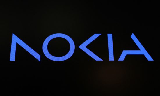 FILE PHOTO: A screen displays the company logo for Nokia Corporation on the floor of the New York Stock Exchange (NYSE) in New York City, U.S., May 24, 2023. REUTERS/Brendan McDermid