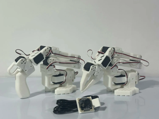 Two robotic arms with white 3D-printed frames and servo motors.